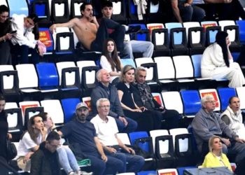 Calin Georgescu surprins cu sotia la concursul de inot